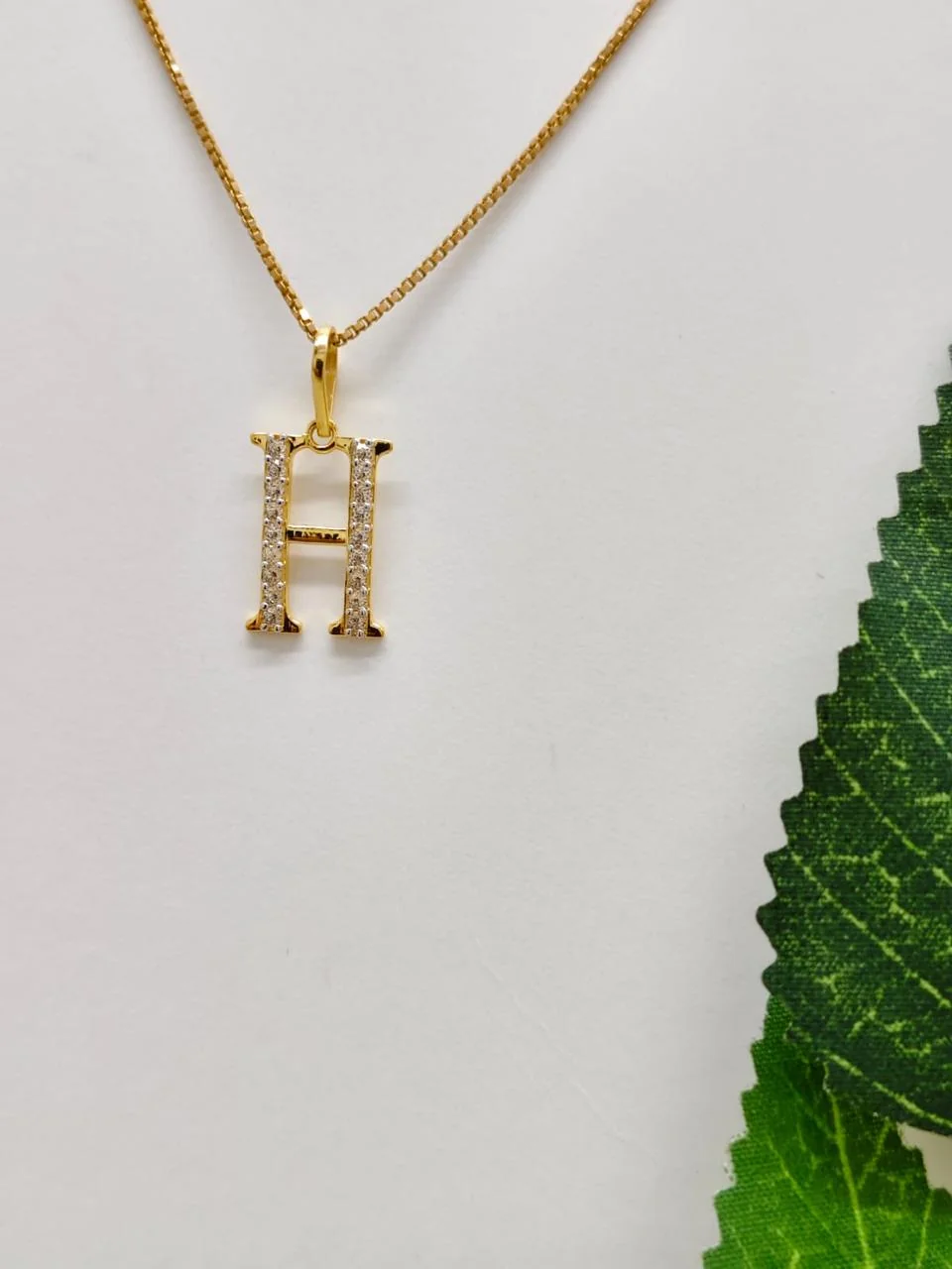 Cz_Letter-Cutting_Pendants